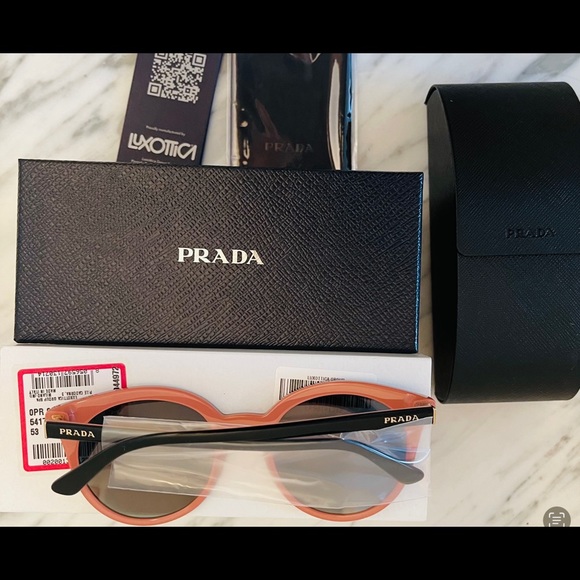 PRADA ROSE PINK MIRROR ROUND LENSES IN BLACK FRAMES WITH PINK ROSE DETAILING - Picture 13 of 16